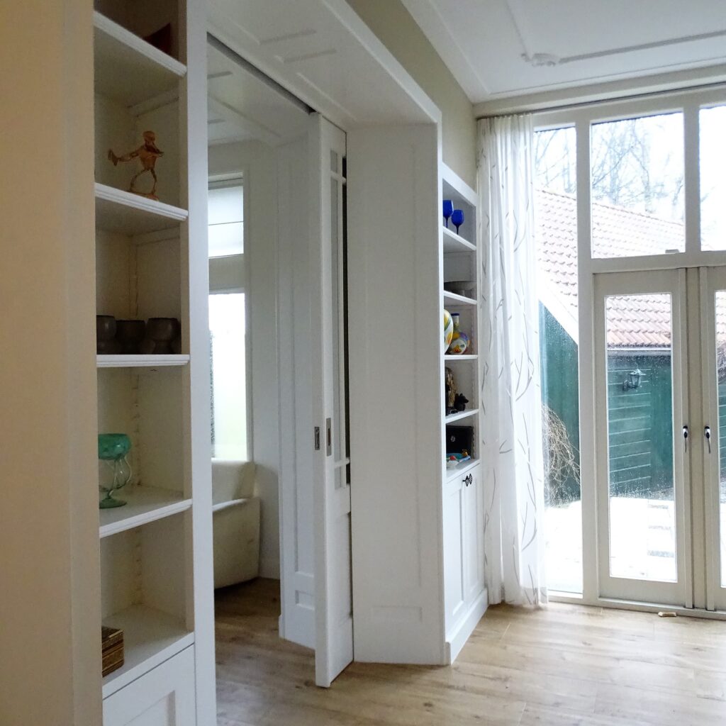 detailfoto dubbelzijdige kamer en suite Interieuver